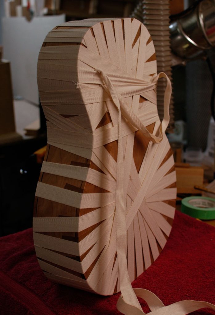 's wrapped in twill tape to help take up gaps. The auditorium prototype after the binding has been glued in place. It's wrapped in twill tape to help take up gaps.