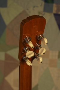 Orchestra guitar no 15 uses Waverly banjo tuners in keeping with the OM heritage.