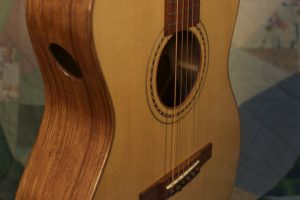 Orchestra guitar no 15 showing the soundport and rosette.