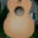 Dye being applied to a sunburst-finished guitar top
