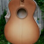 Dye being applied to a sunburst-finished guitar top