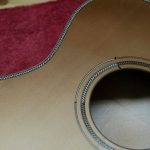 Removing the liquid mask on a sunburst guitar top