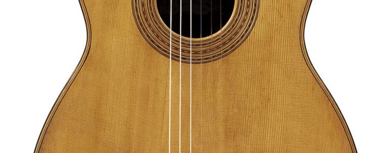The front of a guitar built by Antonio Torres. The spruce top is built up from at least three pieces.