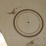 Scraping the installed rosette flat.