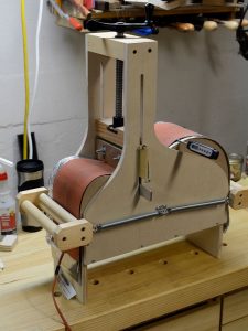 A side being bent in a thermal-blanket side bender