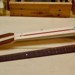 All the pieces are in place and the fingerboard is ready to be glued to the neck.