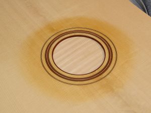 The rosette has been inlaid and is looking sharp. Check out the curl in the spruce top!
