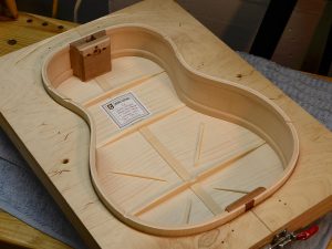 Here I'm checking to make sure the back fits the rims before gluing the box closed.