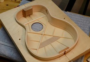 Here I'm checking to make sure the top fits the rims before gluing the box closed.