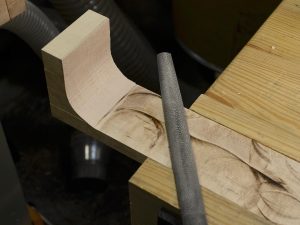 Setting the rough shape of the heel with a rasp.