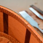 The completed ledge formed by the purfling and binding meeting the lining strip