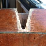 The dovetail neck pocket on a guitar