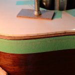 A cut edge on a guitar top