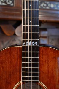 Showing the twelfth fret inlay on a guitar fingerboard